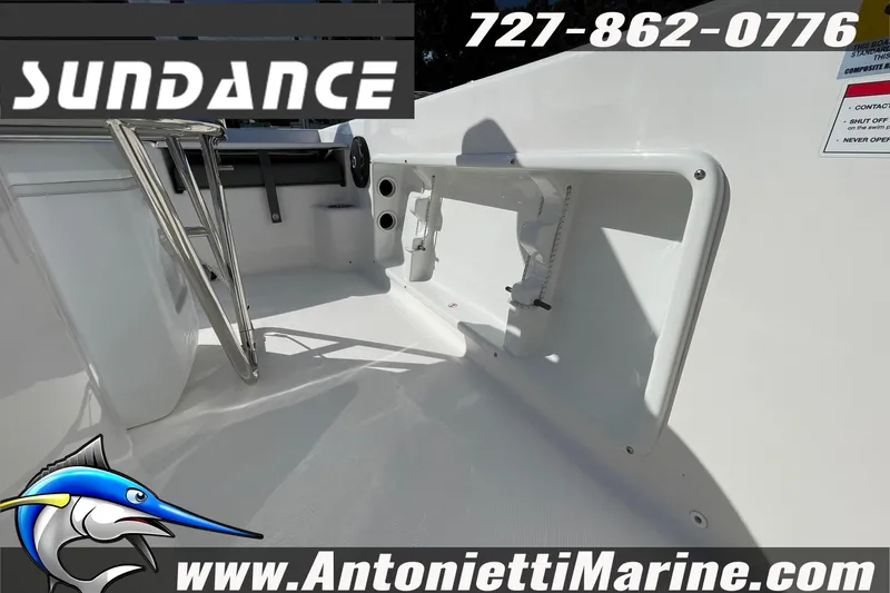 Slide: The Image of 2025 Sundance DX20 boat interior with seating and storage, featuring Antonietti Marine branding. - 19