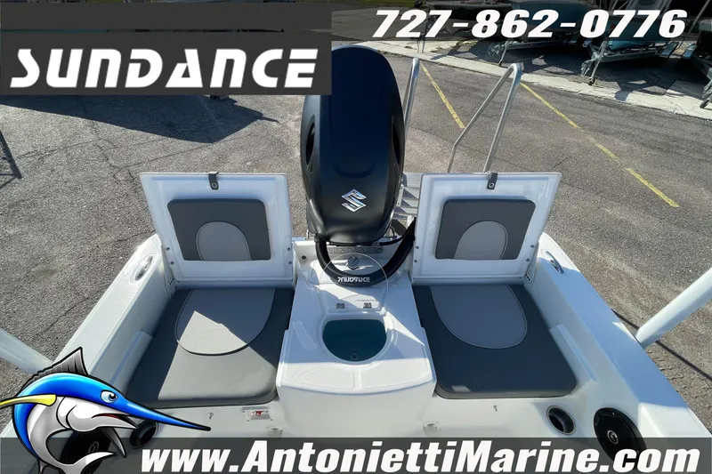 Slide: The Image of 2025 Sundance DX20 boat interior with seating and storage compartments. - 3