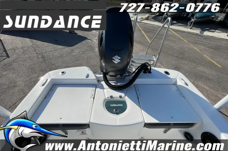 Slide: The Image of 2025 Sundance DX20 boat deck with Suzuki engine, Antonietti Marine branding, and contact information. - 33