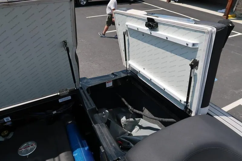 Slide: The Image of Close-up of 2019 MasterCraft XT22 boat's metallic component and steering wheel. - 25