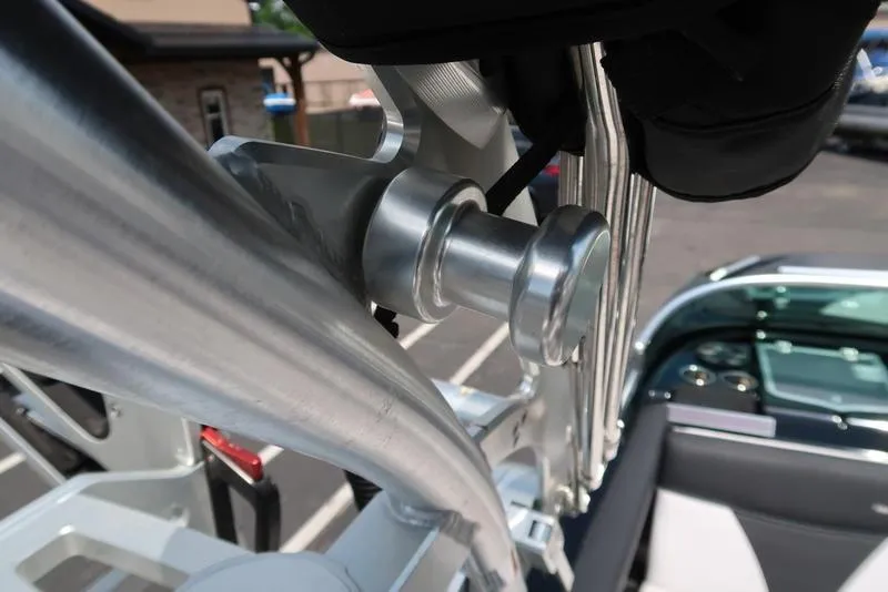 Slide: The Image of Open storage compartments in a 2019 MasterCraft XT22 boat, showing interior details. - 29