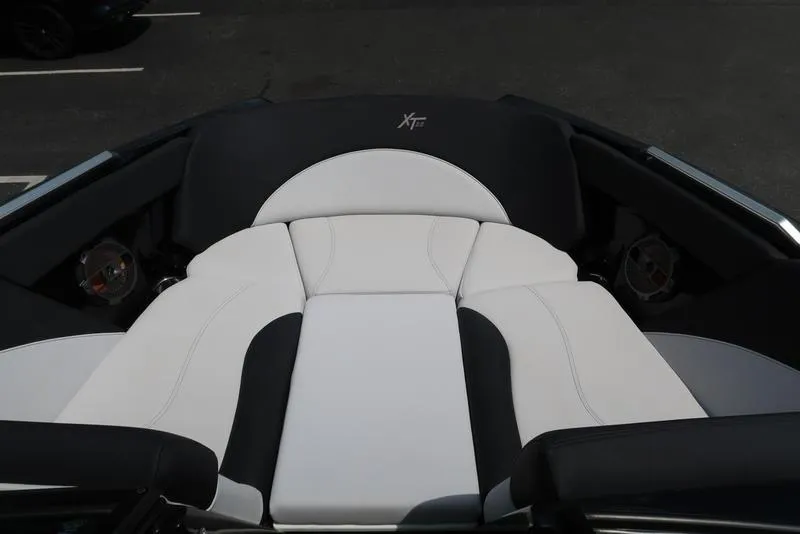Slide: The Image of 2019 MasterCraft XT22 storage compartment with surfboard inside. - 39