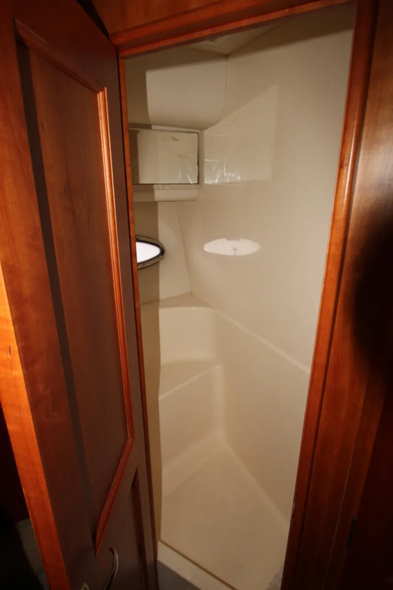 Slide: The Image of Interior view of 2002 Silverton 43 Motor Yacht storage compartment. - 23