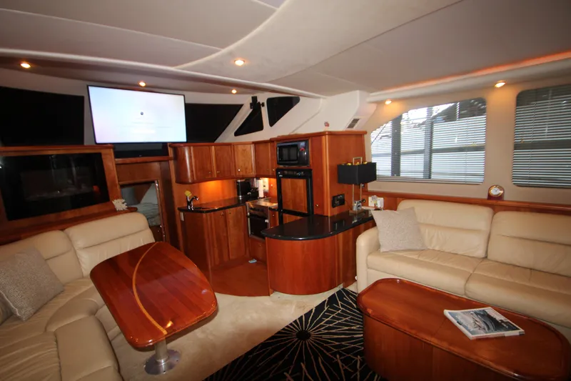 Slide: The Image of Luxurious interior of 2002 Silverton 43 Motor Yacht with leather seating and modern amenities. - 4