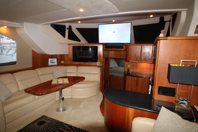 Slide: The Image of Luxurious interior of 2002 Silverton 43 Motor Yacht with leather seating and modern amenities. - 46