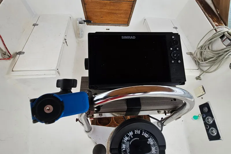 Slide: The Image of Cockpit of 1977 Seafarer 38 sailboat with Simrad navigation system and compass. - 10