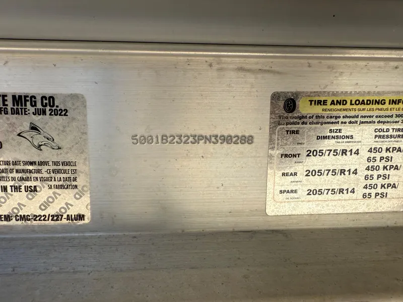 Slide: The Image of Robalo R222 2023 tire and loading information plate with specifications and manufacturing details. - 61