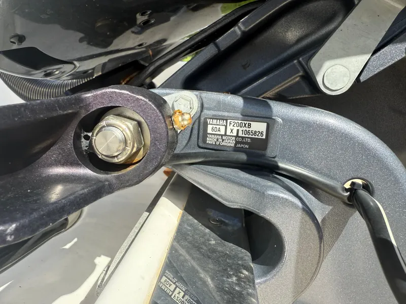 Slide: The Image of Close-up of Yamaha F200XB motor part on 2023 Robalo R222 boat. - 63