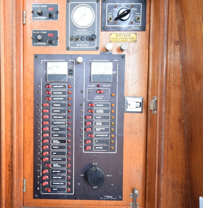 Slide: The Image of Electrical control panel on a 1988 Mediterranean 38 Convertible boat. - 17