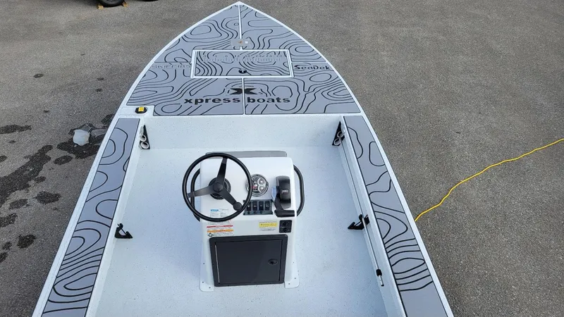 Slide: The Image of 2025 Xpress Skiff 185 with Yamaha Vmax 115 SHO, featuring a sleek design and modern console. - 18