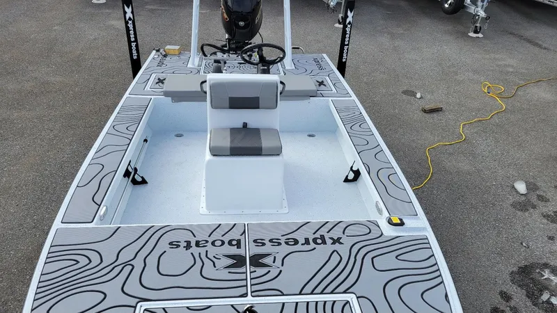 Slide: The Image of 2025 Xpress Skiff 185 with Yamaha Vmax 115 SHO, featuring stylish deck design. - 21