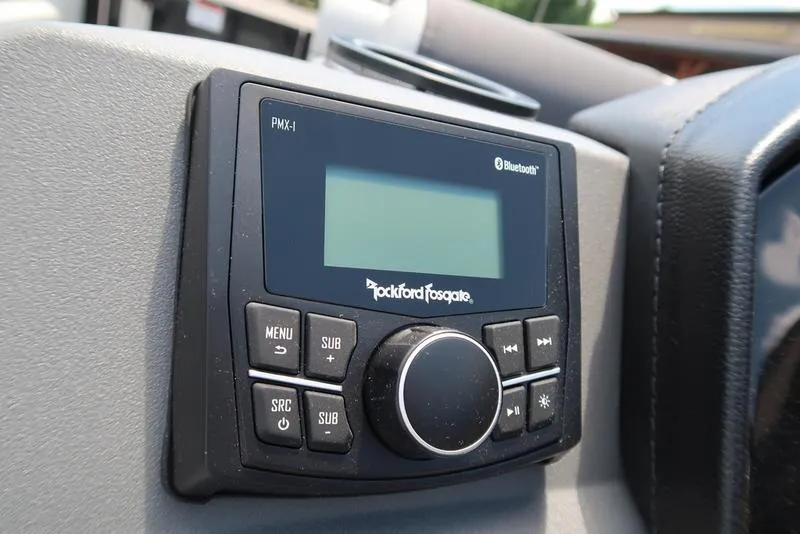 Slide: The Image of Rockford Fosgate PMX-1 audio system on 2025 Bennington S Swingback 22 SSB boat dashboard. - 16