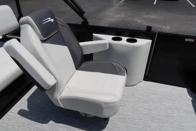 Slide: The Image of 2025 Bennington S Swingback 22 SSB boat seat with armrests and cup holders. - 25