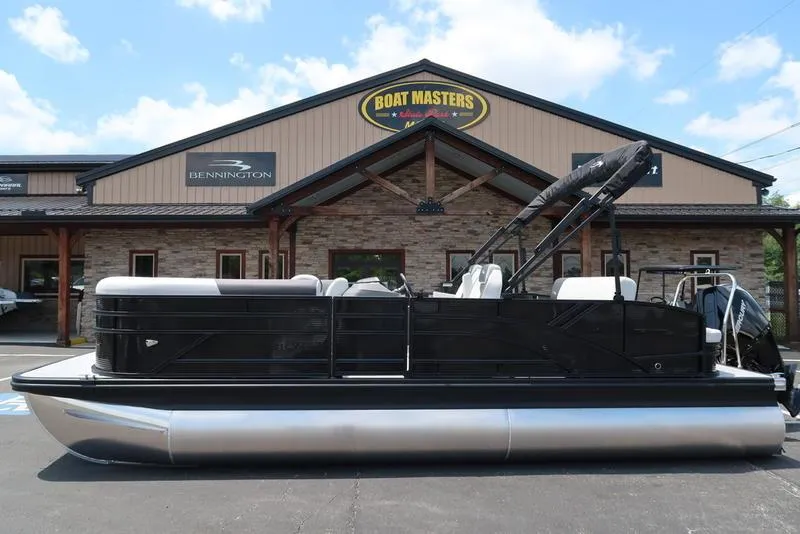Slide: The Image of 2025 Bennington S Swingback 22 SSB pontoon boat displayed at Boat Masters dealership. - 3