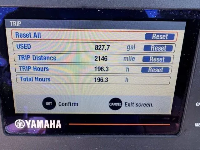 Slide: The Image of Yamaha trip display showing fuel usage, distance, and hours for 2019 NauticStar 251 Hybrid. - 14