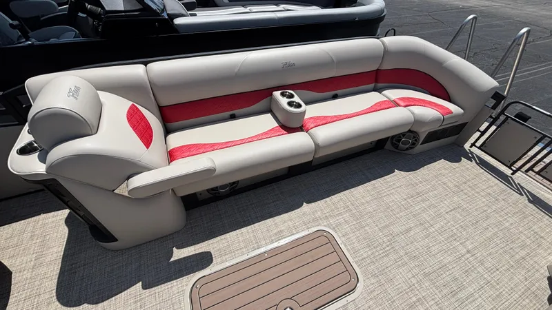 Slide: The Image of Luxurious seating on 2025 JC NEPTOON 27TT SPORT boat with red accents and cup holders. - 3
