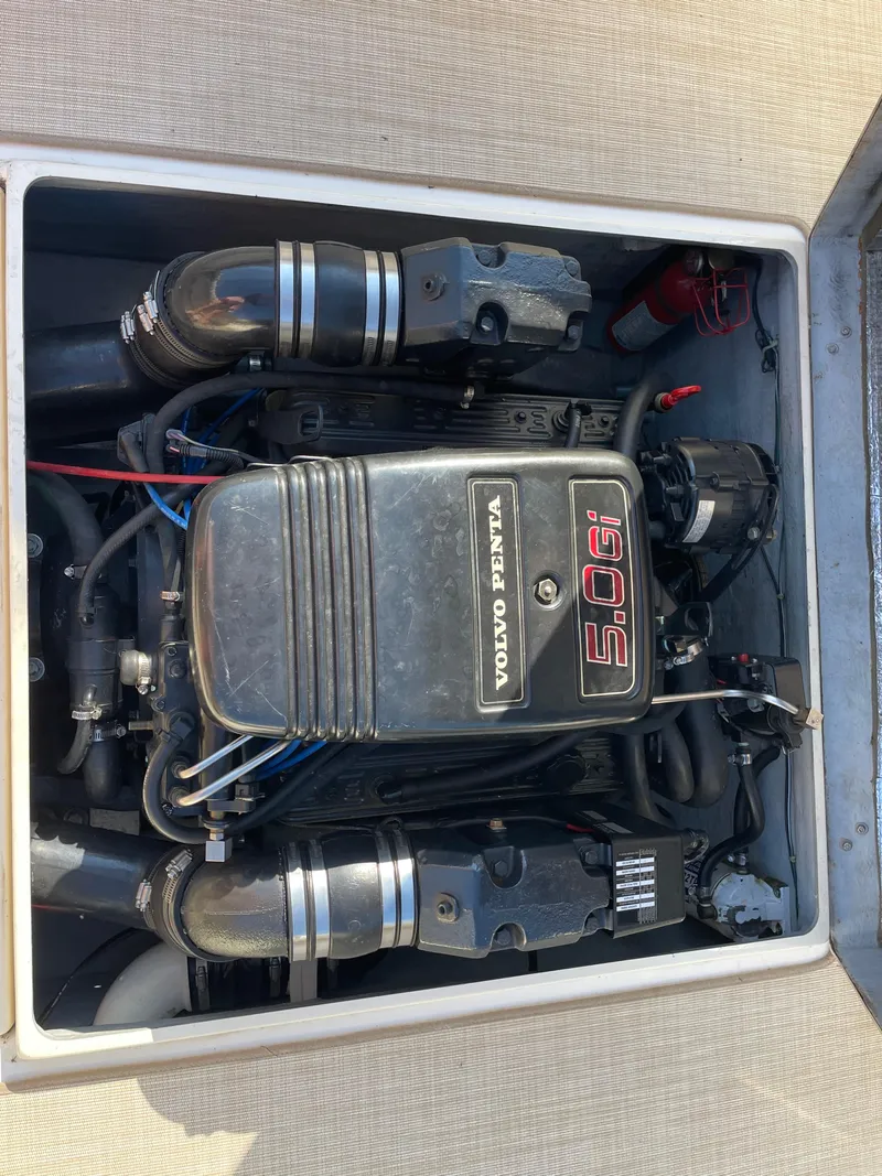 Slide: The Image of Engine compartment of a 1998 Albemarle 247 Cuddy Express with Volvo Penta 5.0Gi engine. - 12