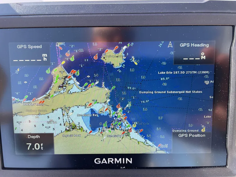 Slide: The Image of Garmin GPS display showing Lake Erie navigation map on Albemarle 247 Cuddy Express, 1998 model. - 17