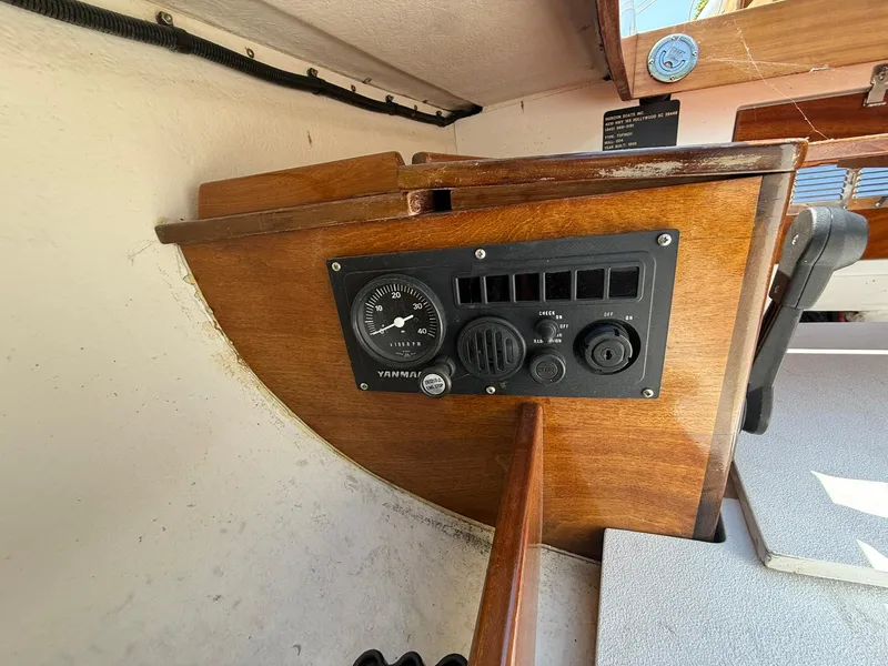 Slide: The Image of Control panel of a 1998 Tofinou 7 sailboat with Yanmar gauge. - 12
