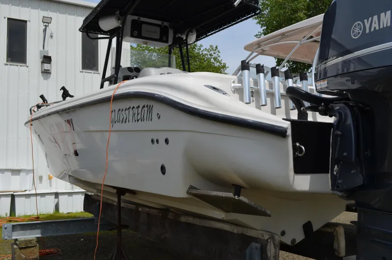 Slide: The Image of 2005 Glasstream 328 SCX boat on trailer, featuring Yamaha outboard motor. - 11