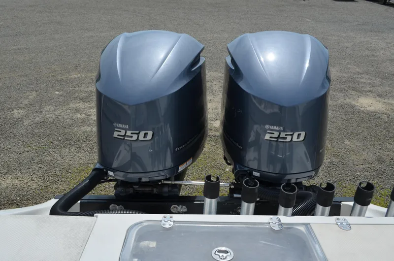 Slide: The Image of Twin Yamaha 250 outboard engines on a 2005 Glasstream 328 SCX boat. - 16