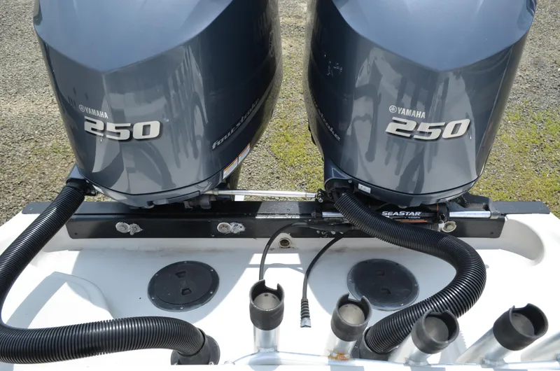 Slide: The Image of Twin Yamaha 250 outboard engines on a 2005 Glasstream 328 SCX boat. - 17