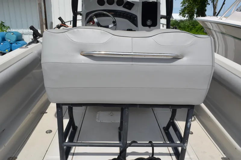 Slide: The Image of 2005 Glasstream 328 SCX boat interior with white seating and steering console. - 22