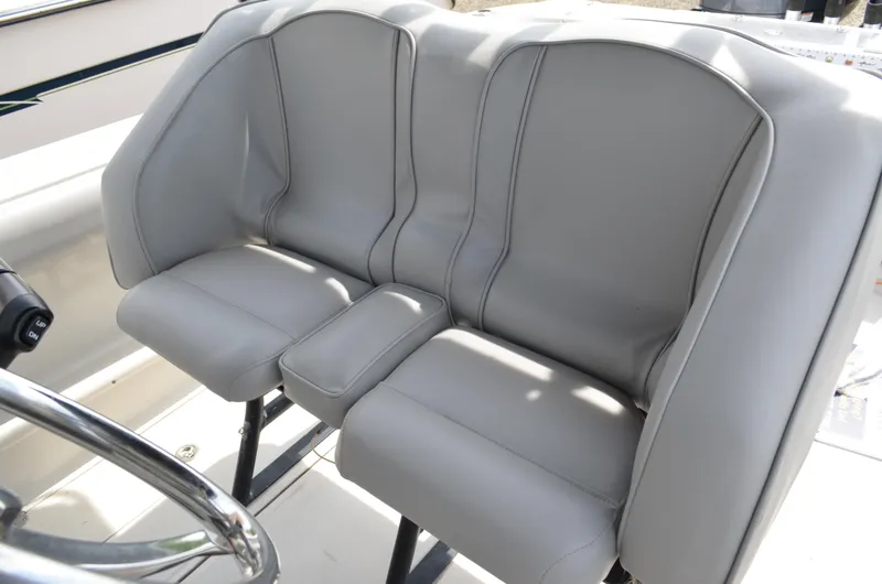 Slide: The Image of Gray leather seats on a 2005 Glasstream 328 SCX boat. - 30