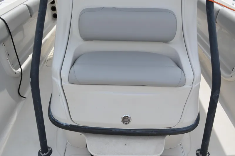 Slide: The Image of 2005 Glasstream 328 SCX boat seat with cushioned backrest and safety rail. - 32
