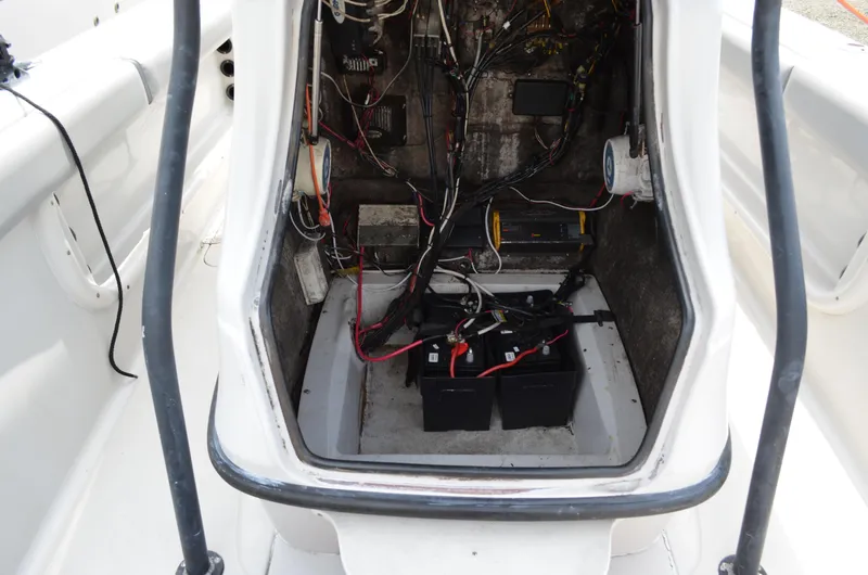 Slide: The Image of 2005 Glasstream 328 SCX boat interior showing wiring and battery compartment. - 33