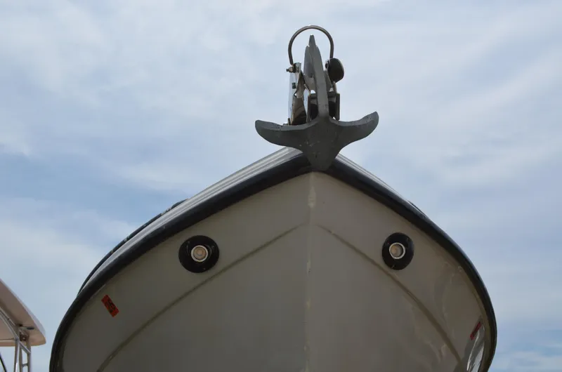 Slide: The Image of Bow view of 2005 Glasstream 328 SCX boat with anchor against cloudy sky. - 7