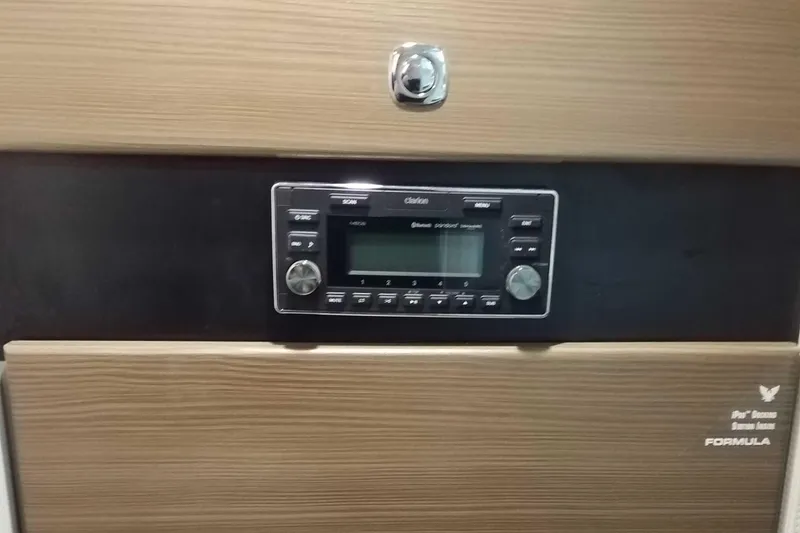 Slide: The Image of 2019 Formula 350 Crossover Bowrider OB dashboard with Clarion audio system. - 21