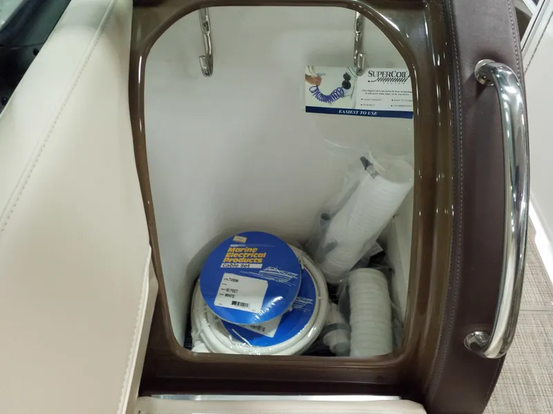 Slide: The Image of 2019 Formula 350 Crossover Bowrider OB storage with marine electrical products and accessories. - 28