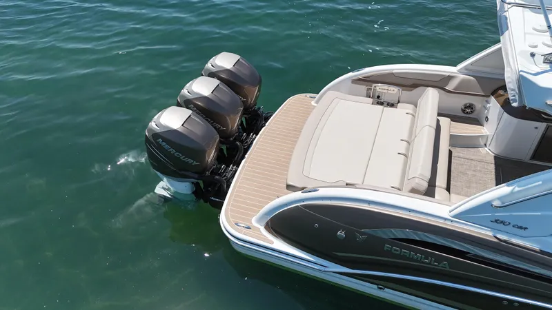 Slide: The Image of 2019 Formula 350 Crossover Bowrider OB with triple Mercury outboard engines on water. - 44