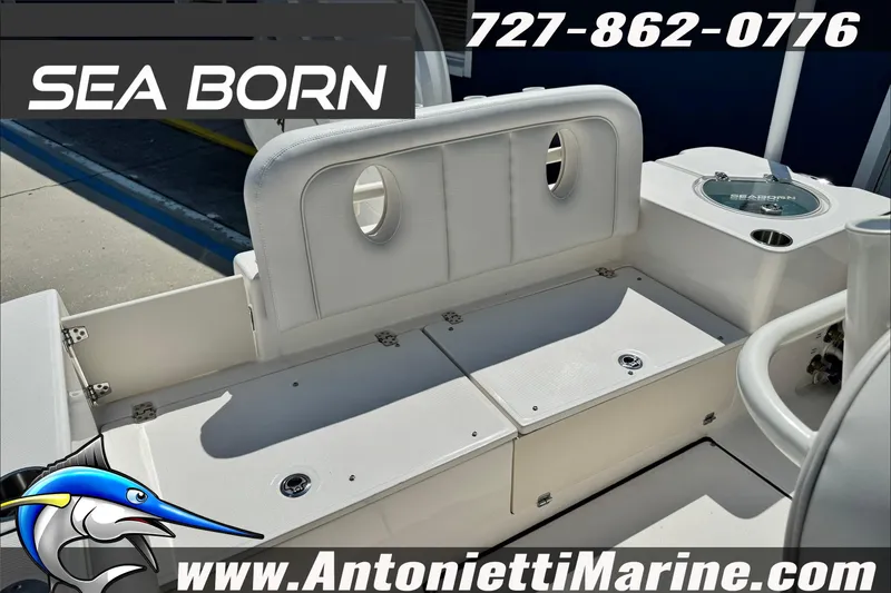 Slide: The Image of 2025 Sea Born LX24 Center Console boat interior with seating and storage compartments. - 11