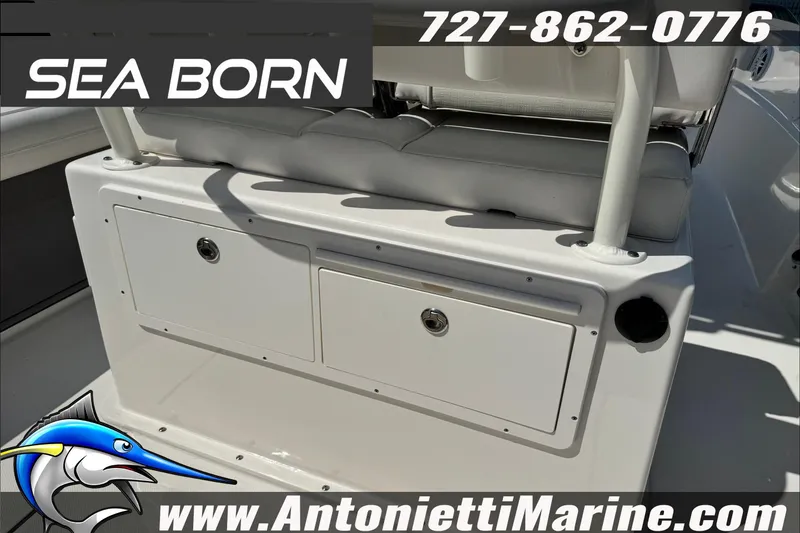 Slide: The Image of 2025 Sea Born LX24 Center Console boat interior with storage compartments. - 26