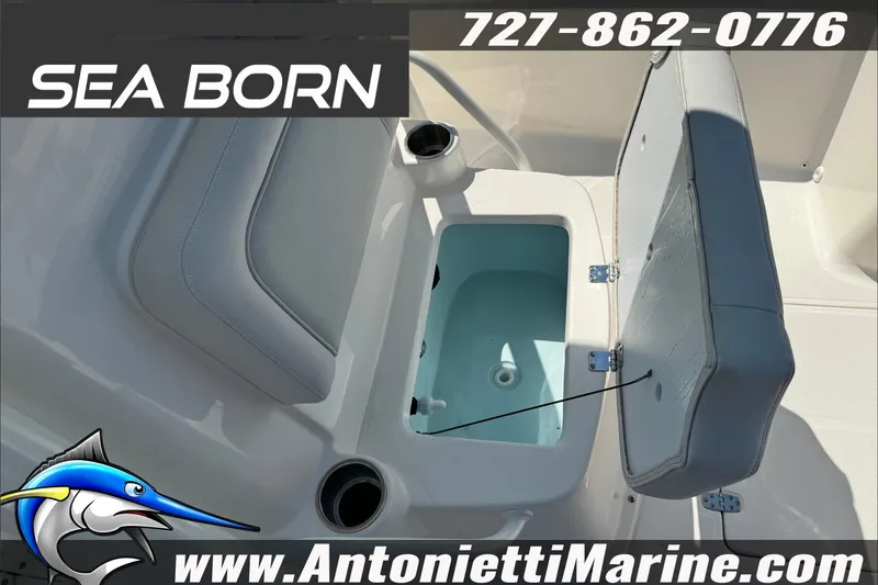 Slide: The Image of 2025 Sea Born LX24 Center Console boat interior with open storage compartment. - 37