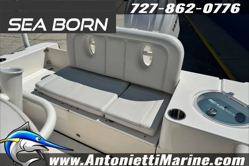 Slide: The Image of 2025 Sea Born LX24 Center Console boat interior with seating and livewell. - 42
