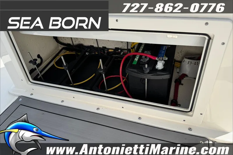 Slide: The Image of 2025 Sea Born LX24 Center Console battery compartment with wiring, Antonietti Marine branding. - 44
