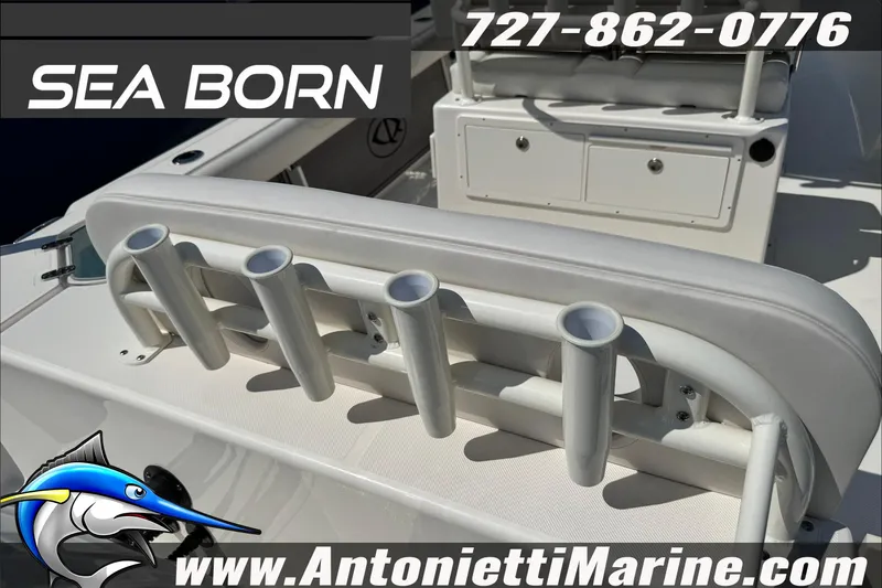 Slide: The Image of 2025 Sea Born LX24 Center Console boat with rod holders and storage compartments. - 45