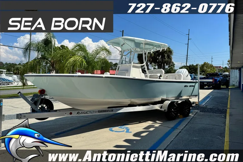 Slide: The Image of 2025 Sea Born LX24 Center Console boat on trailer at Antonietti Marine dealership. - 5