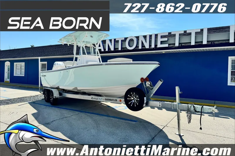 Slide: The Image of 2025 Sea Born LX24 Center Console boat on trailer at Antonietti Marine dealership. - 6