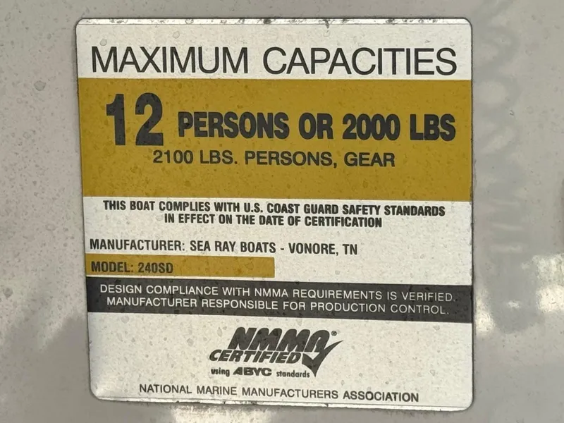 Slide: The Image of 2005 Sea Ray 240 Sundeck capacity label, 12 persons or 2000 lbs, NMMA certified. - 31