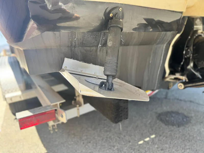 Slide: The Image of Rear view of a 2005 Sea Ray 240 Sundeck boat on a trailer. - 8