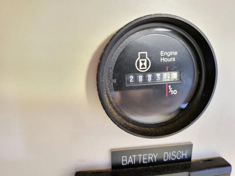 Slide: The Image of Engine hour meter showing 2883.2 hours on 1983 Irwin 38 Center Cockpit. - 17