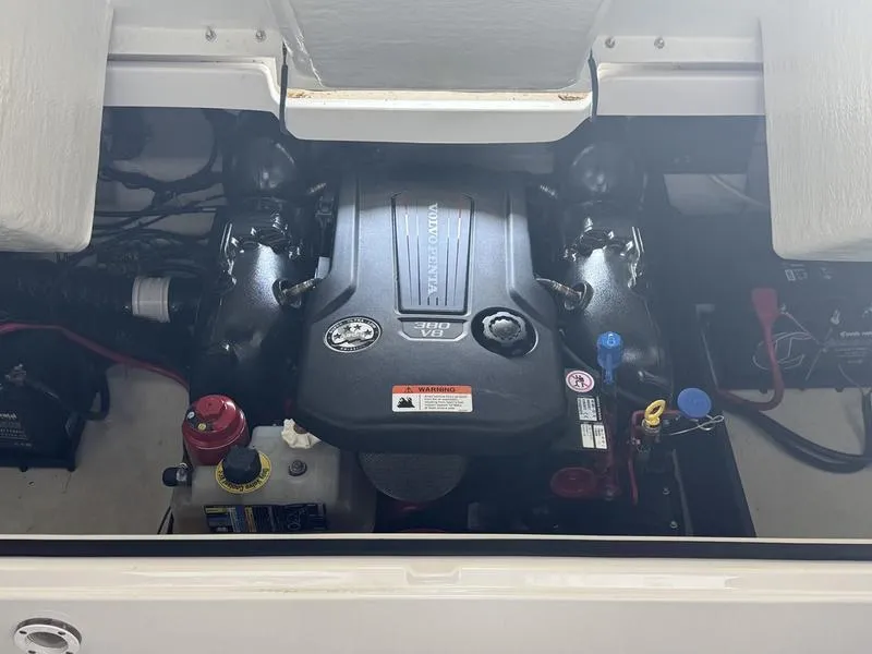 Slide: The Image of Engine compartment of a 2019 Regal 2800 boat featuring a Volvo Penta 380 V8 engine. - 11