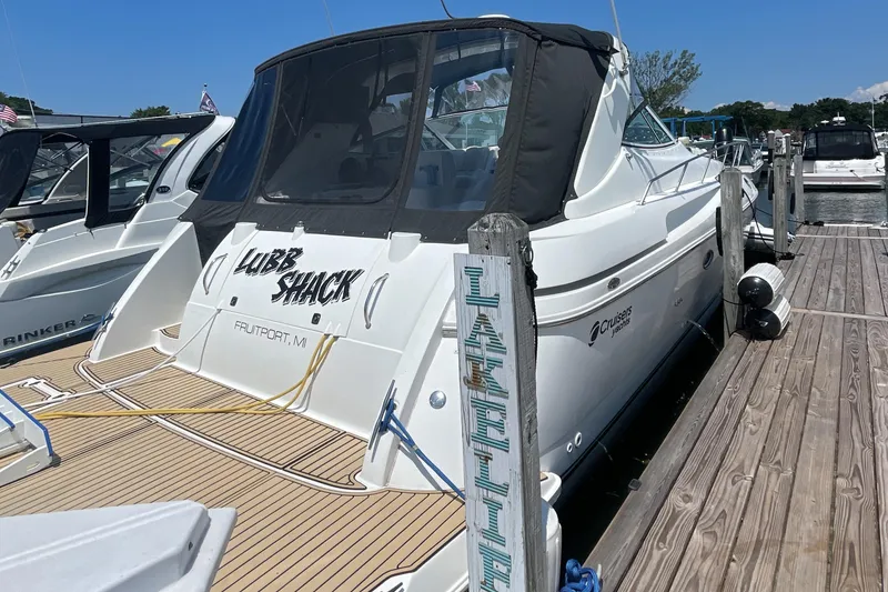 Slide: The Image of 2000 Cruisers Yachts 3870 Express docked at marina, Fruitport, MI. - 3