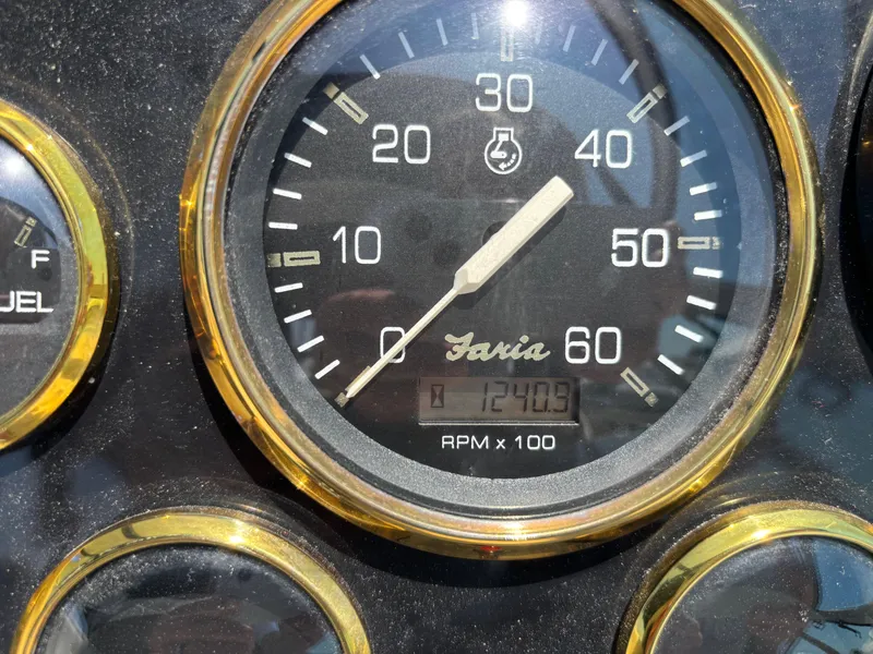 Slide: The Image of Close-up of a Faria tachometer on a 2000 Cruisers Yachts 3870 Express. - 62