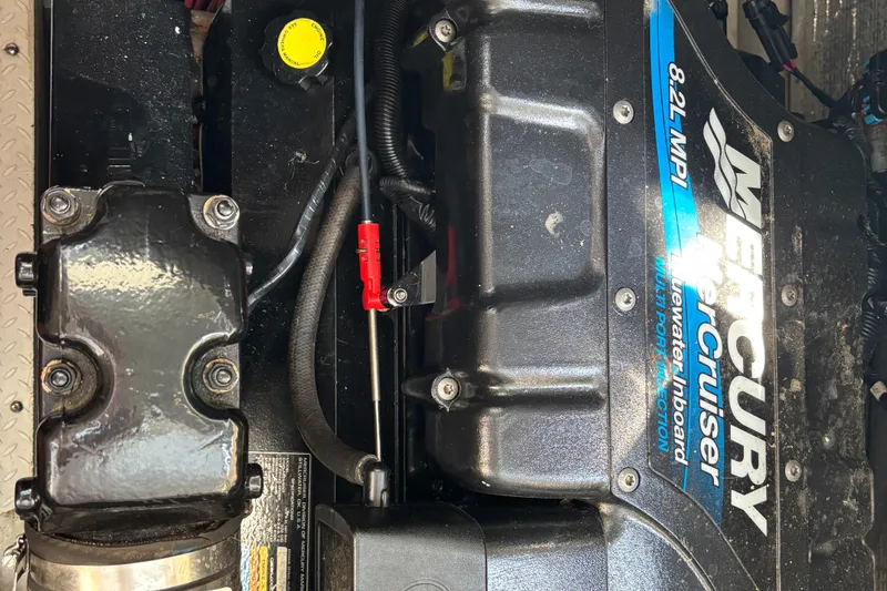 Slide: The Image of Engine of 2000 Cruisers Yachts 3870 Express with Mercury MerCruiser 8.2L MPI. - 69