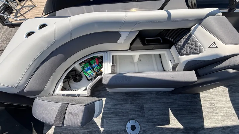 Slide: The Image of Viaggio Diamante D26U 2025 boat seat with open storage compartment, revealing interior details. - 10